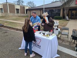 Lennard Dowdle & Becky Easley handing out samples of our award winning chili! 